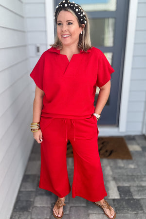Travel On Textured Pants: Red