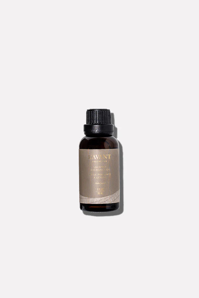 L'AVANT Collective: Laundry Oil Ambre Santal 1oz