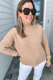 Molly Bracken: Beige Turtleneck Sweater