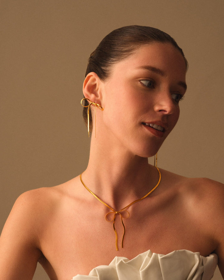 Katie Loxton: Amelie Waterproof Gold Bow Oversized Earrings